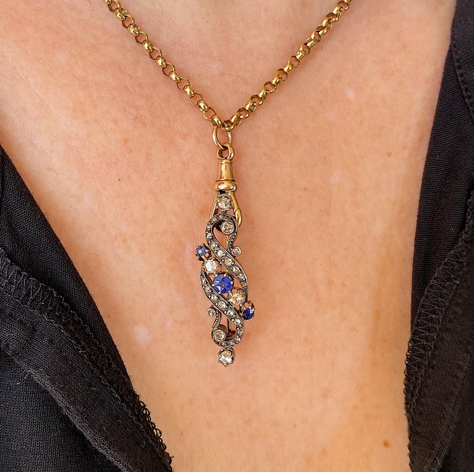 סיכה ויקטוריאנית זהב וכסף עם ספירים ויהלומים.