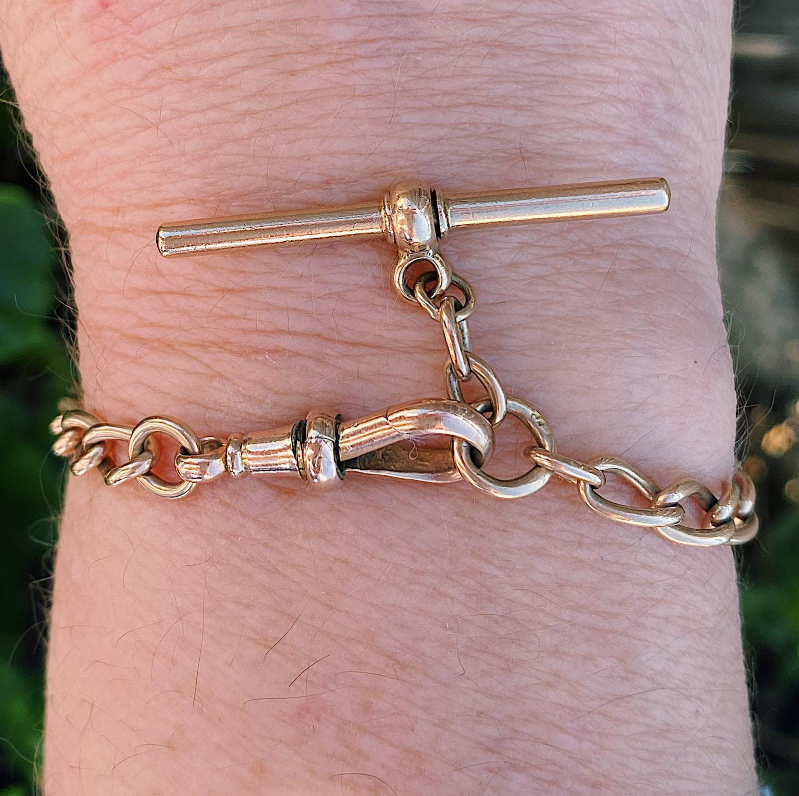 צמיד חוליות אנגלי מזהב עם T-bar ו dog סוגר.